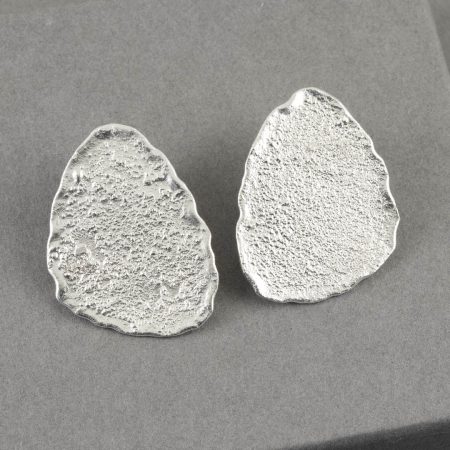 Large freeform stud earrings in bright textured sterling silver