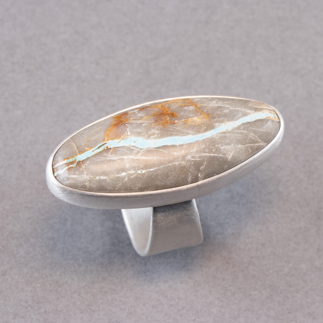 Handmade Royston ribbon turquoise ring in brushed sterling silver