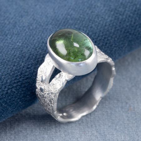 Green tourmaline ring in bright textured sterling silver