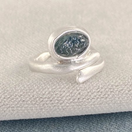 One of a kind raw blue sapphire on molten ring in brushed sterling silver